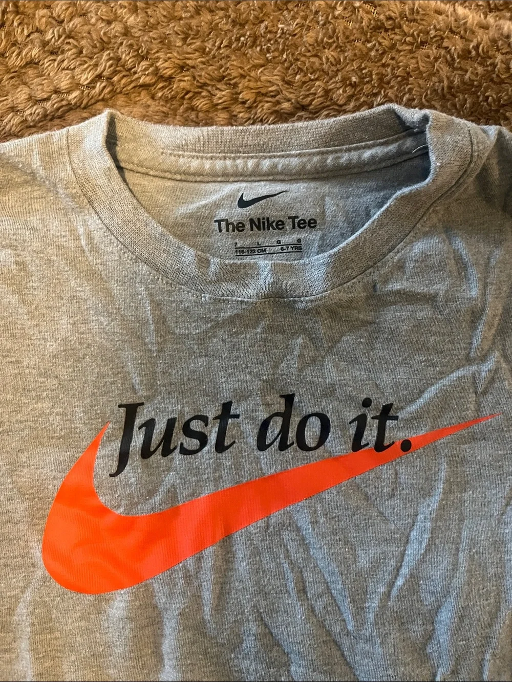 Nike Gray Tee with Orange Swoosh and Black Text
